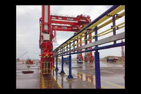 Conductor bar systems supply electrical power using a current collector trolley